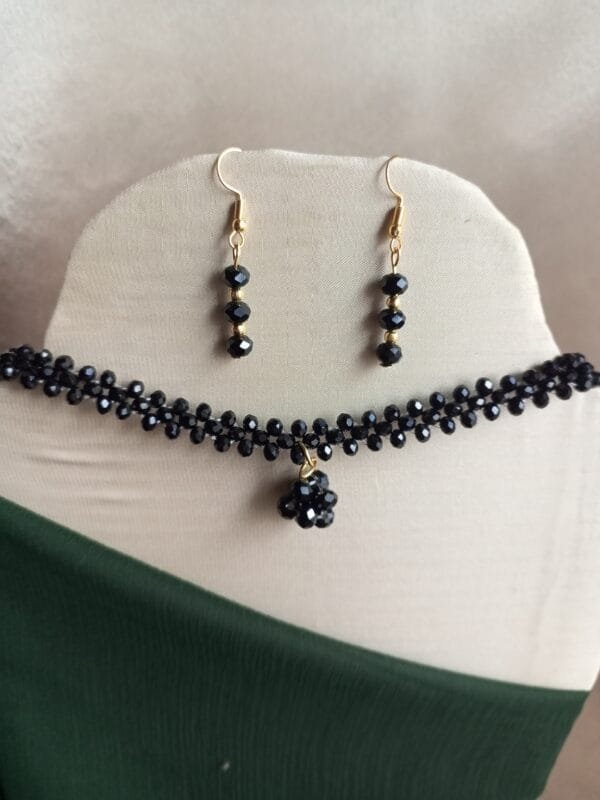 Elegant Black Beaded Choker with earrings by CHAMMAQ.