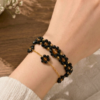 Black Crystal Floral Beaded Bracelet Set | 2 in 1 Black Bracelet Set by CHAMMAQ - Image 4