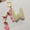 Personalized Alphabet Pearl Keychain – Handmade Beaded Keychain with Flower Charm | CHAMMAQ - Image 3